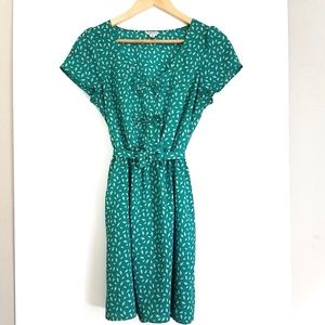 Cute blue-green dress with bows